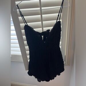 Women’s black romper size M.